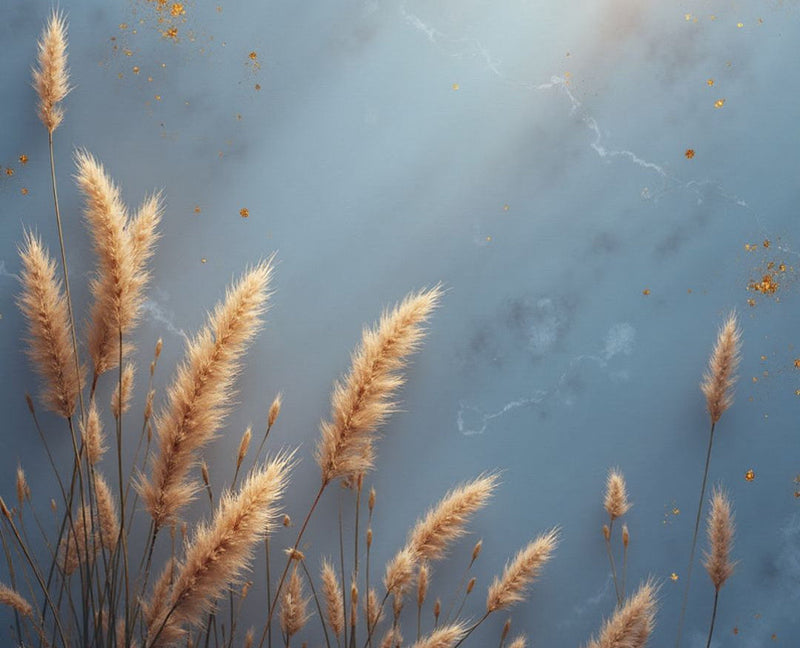 Prairie grasses swaying in the wind with a gold flecked, blue marble background and a ray of soft light shining.